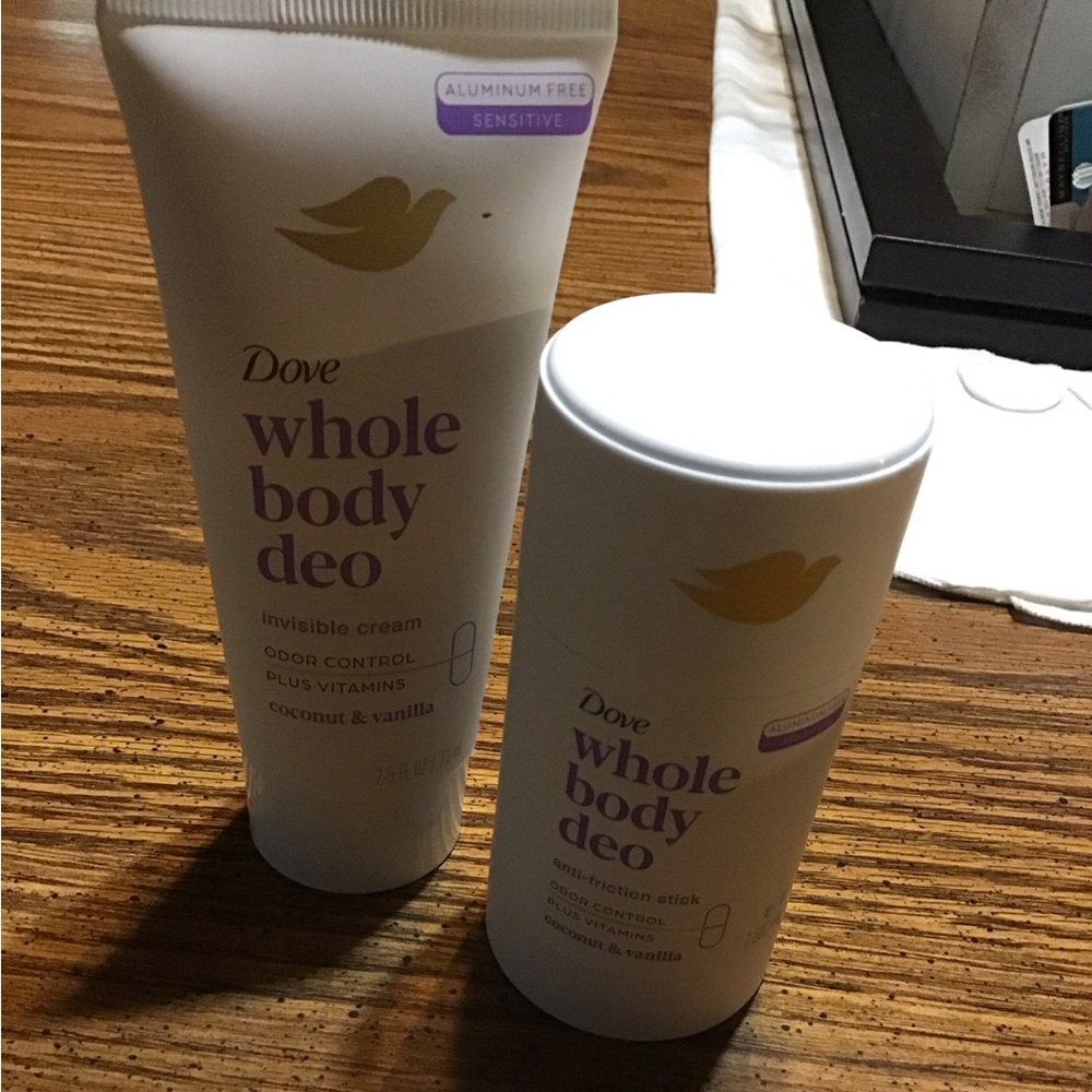 A total of two dove whole body deodorant, coconut vanilla